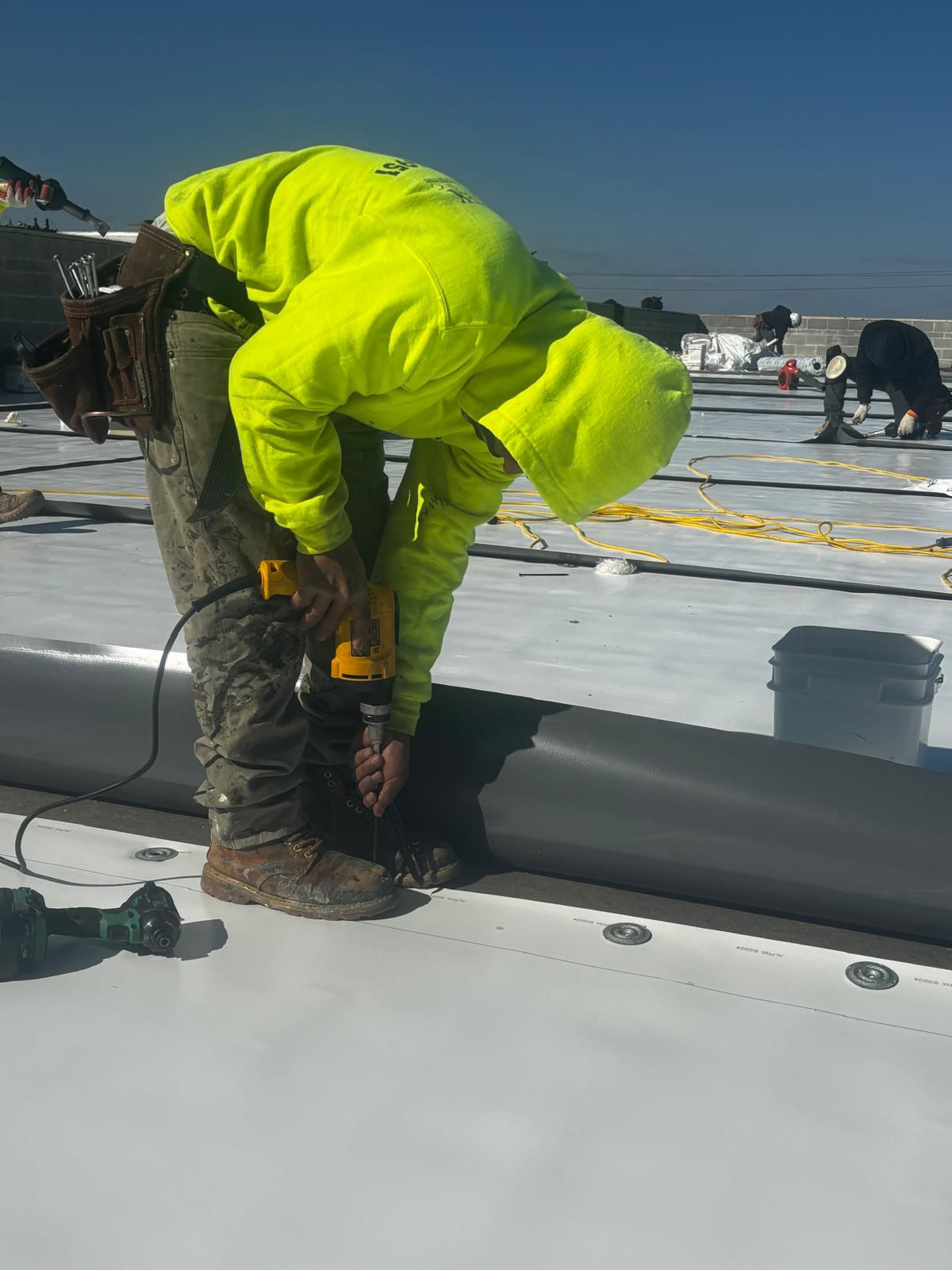 Commercial flat roof TPO membrane installation